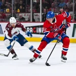 Alerte transaction surprise confirmée pour un gros ailier de 6 pieds 4 pouces 22 mars 2025; Montréal, Québec, Canada; Patrik Laine (92), ailier droit des Canadiens de Montréal, joue la rondelle contre Valeri Nichushkin (13), ailier droit de l\'Avalanche du Colorado, en deuxième période au Centre Bell.