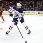 Feb 25, 2026; Anaheim, California, USA; Edmonton Oilers defenseman Darnell Nurse (25) controls the puck during the second period against the Anaheim Ducks at Honda Center.