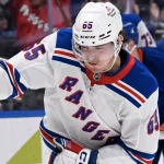 Alerte transaction chez le Canadien: Kent Hughes bouge et fait l'acquisition d'un jeune ailier gauche 10 avril 2025 ; Elmont, New York, États-Unis ; L\'ailier gauche des Rangers de New York, Brett Berard (65), célèbre son but contre les Islanders de New York au cours de la troisième période à l\'UBS Arena.