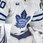 Oct 26, 2023; Dallas, Texas, USA; A view of the logo on the jersey of Toronto Maple Leafs goaltender Joseph Woll (60) in action during the game between the Dallas Stars and the Toronto Maple Leafs at the American Airlines Center.