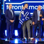 Jun 28, 2024; Las Vegas, Nevada, USA; Ben Danford is selected by the Toronto Maple Leafs with the 31st overall pick in the first round of the 2024 NHL Draft at The Sphere. Mandatory Credit: Stephen R. Sylvanie-Imagn Images