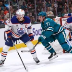 Apr 8, 2026; San Jose, California, USA; Edmonton Oilers center Connor McDavid (97) and San Jose Sharks center Macklin Celebrini (71) wait for the puck during the second period at SAP Center at San Jose.