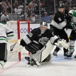 Jan 12, 2026; Los Angeles, California, USA; Los Angeles Kings defenseman Drew Doughty (8) blocks out Dallas Stars right wing Mikko Rantanen (96) as Los Angeles Kings goaltender Darcy Kuemper (35) defends a shot on goal by Dallas Stars center Sam Steel (18) in the third period at Crypto.com Arena.