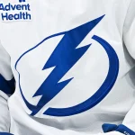 Jan 21, 2025; Montreal, Quebec, CAN; View of a Tampa Bay Lightning logo on a jersey worn by a member of the team during the first period at Bell Centre.
