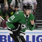 Apr 7, 2026; Dallas, Texas, USA; Dallas Stars left wing Jason Robertson (21) skates with plugs in his nose after he is hit with the high stick o Calgary Flames center Ryan Strome (not pictured) during the overtime period at the American Airlines Center