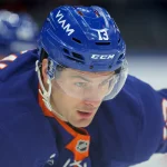 Mar 28, 2026; Elmont, New York, USA; New York Islanders center Mathew Barzal (13) skates against the Florida Panthers during the first period at UBS Arena.