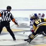 Mar 12, 2023; Pittsburgh, Pennsylvania, USA; New York Rangers center Vincent Trocheck (16) and Pittsburgh Penguins center Sidney Crosby (87) take the opening face-off during the first period at PPG Paints Arena. Mandatory Credit: Charles LeClaire-Imagn Images