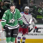Apr 11, 2026; Dallas, Texas, USA; Dallas Stars left wing Jason Robertson (21) skates off the ice after he scores an empty net goal against the New York Rangers during the third period at the American Airlines Center.