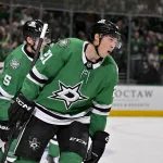 Mar 24, 2026; Dallas, Texas, USA; Dallas Stars defenseman Nils Lundkvist (5) and left wing Jason Robertson (21) celebrates a goal scored by Robertson against the New Jersey Devils during the second period at the American Airlines Center.