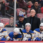 Feb 2, 2026; Sunrise, Florida, USA; Buffalo Sabres head coach Lindy Ruff looks on from the bench against the Florida Panthers during the third period at Amerant Bank Arena.