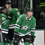 Apr 7, 2026; Dallas, Texas, USA; Dallas Stars left wing Jason Robertson (21) smiles after he scores the game tying goal against Calgary Flames goaltender Devin Cooley (not pictured) during the third period at the American Airlines Center.
