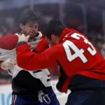 Oct 31, 2024; Washington, District of Columbia, USA; Montreal Canadiens right wing Josh Anderson (17) fight Washington Capitals right wing Tom Wilson (43) in the third period at Capital One Arena.