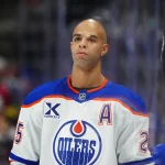 Nov 30, 2024; Denver, Colorado, USA; Edmonton Oilers defenseman Darnell Nurse (25) before the game against the Colorado Avalanche at Ball Arena. Mandatory Credit: Ron Chenoy-Imagn Images
