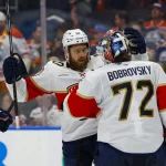 Jun 14, 2025; Edmonton, Alberta, CAN; Florida Panthers forward A.J. Greer (10) celebrates with goaltender Sergei Bobrovsky (72) after the third period against the Edmonton Oilers in game five of the 2025 Stanley Cup Final at Rogers Place.