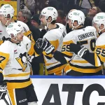 Jan 22, 2026; Edmonton, Alberta, CAN; The Pittsburgh Penguins celebrate a goal scored by forward Sidney Crosby (87) during the first period against the Edmonton Oilers at Rogers Place.