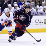 Feb 14, 2019; Columbus, OH, USA; New York Islanders right wing Leo Komarov (47) defends against Columbus Blue Jackets defenseman Zach Werenski (8) at Nationwide Arena.