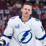 Apr 26, 2026; Montreal, Quebec, CAN; Tampa Bay Lightning right wing Corey Perry (10) looks on during warm-up before the game against the Montreal Canadiens in game four of the first round of the 2026 Stanley Cup Playoffs at Bell Centre.