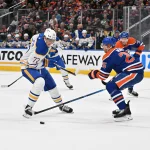 Oilers complete trade with the Sabres involving a goaltender Dec 9, 2025; Edmonton, Alberta, CAN; Buffalo Sabres center Tage Thompson (72) and Edmonton Oilers defenseman Darnell Nurse (25) chase the puck during the second period at Rogers Place. Mandatory Credit: Walter Tychnowicz-Imagn Images