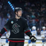 Mar 4, 2026; Seattle, Washington, USA; Seattle Kraken defenseman Jamie Oleksiak (24) looks on in the third period against the St. Louis Blues at Climate Pledge Arena.