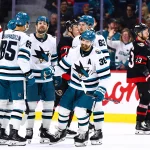 Mar 15, 2026; Ottawa, Ontario, CAN; San Jose Sharks defenseman Mario Ferraro (38) celebrates after scoring during the first period at Canadian Tire Centre.