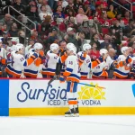 Apr 4, 2026; Raleigh, North Carolina, USA; New York Islanders center Marc Gatcomb (16) celebrates his goal against the Carolina Hurricanes during the first period at Lenovo Center. Mandatory Credit: James Guillory-Imagn Images