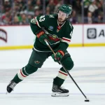 May 11, 2026; Saint Paul, Minnesota, USA; Minnesota Wild defenseman Quinn Hughes (43) skates with the puck against the Colorado Avalanche during the second period in game four of the second round of the 2026 Stanley Cup Playoffs at Grand Casino Arena.