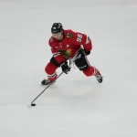 Apr 15, 2026; Chicago, Illinois, USA; Chicago Blackhawks center Connor Bedard (98) skates a against the San Jose Sharks during the second period at United Center.
