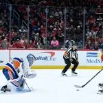 Feb 2, 2026; Washington, District of Columbia, USA; New York Islanders goaltender David Rittich (33) defends the net against Washington Capitals left wing Anthony Beauvillier (72) during the first period at Capital One Arena.