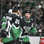 Mar 12, 2026; Dallas, Texas, USA; Dallas Stars left wing Jason Robertson (21) and center Wyatt Johnston (53) and left wing Jamie Benn (14) celebrates a goal scored by Johnston during the game between the Stars and the Oilers at the American Airlines Center.