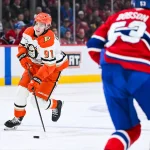15 mars 2026 ; Montréal, Québec, Canada ; le joueur de centre des Ducks d\'Anaheim Leo Carlsson (91) dispute la rondelle aux Canadiens de Montréal durant la deuxième période au Centre Bell.