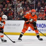 Mar 18, 2026; Anaheim, California, USA; Anaheim Ducks center Leo Carlsson (91) moves the puck against Philadelphia Flyers center Denver Barkey (52) during the second period at Honda Center.