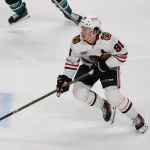 Apr 6, 2026; San Jose, California, USA; Chicago Blackhawks center Connor Bedard (98) controls the puck against the San Jose Sharks in the third period at SAP Center at San Jose.