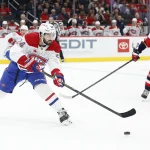 13 janvier 2026 ; Washington, District de Columbia, États-Unis ; le centre des Canadiens de Montréal, Phillip Danault (24), passe la rondelle tandis que le centre des Capitals de Washington, Hendrix Lapierre (29), la poursuit durant la première période au Capital One Arena.
