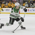 Oct 26, 2025; Nashville, Tennessee, USA; Dallas Stars center Mavrik Bourque (22) takes a shot on goal against the Nashville Predators during the second period at Bridgestone Arena.