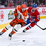 Mar 15, 2026; Montreal, Quebec, CAN; Anaheim Ducks defenseman Pavel Mintyukov (98) defends the puck against Montreal Canadiens left wing Alexandre Texier (85) during the third period at Bell Centre. Mandatory Credit: David Kirouac-Imagn Images