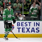 Apr 11, 2026; Dallas, Texas, USA; Dallas Stars left wing Jason Robertson (21) skates off the ice after he scores an empty net goal against the New York Rangers during the third period at the American Airlines Center.