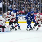 Apr 29, 2025; Toronto, Ontario, CAN; Toronto Maple Leafs center Auston Matthews (34) battles with Ottawa Senators right wing Claude Giroux (28) in the third period during game five of the first round of the 2025 Stanley Cup Playoffs at Scotiabank Arena.