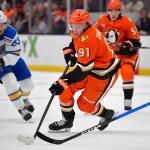 Apr 3, 2026; Anaheim, California, USA; Anaheim Ducks center Leo Carlsson (91) moves the puck against the St. Louis Blues during the second period at Honda Center.