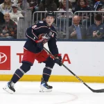 Feb 4, 2026; Columbus, Ohio, USA; Columbus Blue Jackets defenseman Zach Werenski (8) controls the puck against the Chicago Blackhawks during the first period at Nationwide Arena.