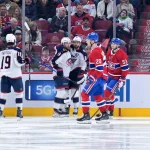 11 avril 2026; Montréal, Québec, Canada; L'attaquant des Blue Jackets de Columbus, Kirill Marchenko (86), célèbre avec ses coéquipiers après avoir marqué un but contre les Canadiens de Montréal en deuxième période au Centre Bell.