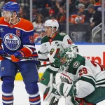 Nov 21, 2024; Edmonton, Alberta, CAN; Edmonton Oilers forward Connor McDavid (97) looks for a rebound in front of Minnesota Wild goaltender Marc-Andre Fleury (29) during the third period at Rogers Place. Mandatory Credit: Perry Nelson-Imagn Images