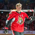 Dec 4, 2014; Ottawa, Ontario, CAN; Ottawa Senators former player Daniel Alfredsson (11) takes part in a pre-game ceremony prior to game against the New York Islanders at Canadian Tire Centre.