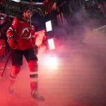 Apr 9, 2026; Newark, New Jersey, USA; New Jersey Devils center Nico Hischier (13) makes his entrance to the ice after the first period against the Pittsburgh Penguins at Prudential Center.