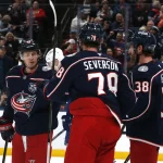 Jan 15, 2026; Columbus, Ohio, USA; Columbus Blue Jackets center Kent Johnson (91) celebrates after his goal against the Vancouver Canucks during the third period at Nationwide Arena.