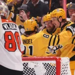 Apr 27, 2026; Pittsburgh, Pennsylvania, USA; Pittsburgh Penguins left wing Elmer Soderblom (right) celebrates his goal with center Ben Kindel (81) and right wing Anthony Mantha (39) against Philadelphia Flyers goaltender Dan Vladar (80) during the first period in game five of the first round of the 2026 Stanley Cup Playoffs at PPG Paints Arena.