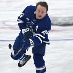 Jan 1, 2026; Toronto, Ontario, CAN; Toronto Maple Leafs defenseman Morgan Rielly (60) warms up before playing the Winnipeg Jets at Scotiabank Arena. Mandatory Credit: Dan Hamilton-Imagn Images