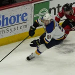 Why the NHL's cap boom left three scorers stranded Feb 27, 2022; Chicago, Illinois, USA; Chicago Blackhawks right wing Patrick Kane (88) defends St. Louis Blues right wing Vladimir Tarasenko (91) during the first period at United Center. Mandatory Credit: David Banks-Imagn Images