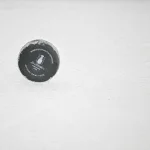 May 29, 2023; Dallas, Texas, USA; A view of an NHL puck with the Stanley Cup logo on the ice during the first period between the Dallas Stars and the Vegas Golden Knights in game six of the Western Conference Finals of the 2023 Stanley Cup Playoffs at American Airlines Center.