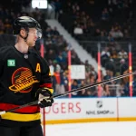 Apr 7, 2026; Vancouver, British Columbia, CAN; Vancouver Canucks forward Elias Pettersson (40) handles the puck in warm up prior to a game against the Vegas Golden Knights at Rogers Arena.