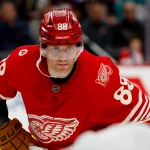 Mar 6, 2026; Detroit, Michigan, USA; Detroit Red Wings right wing Patrick Kane (88) gets set during a face-off in the second period against the Florida Panthers at Little Caesars Arena.